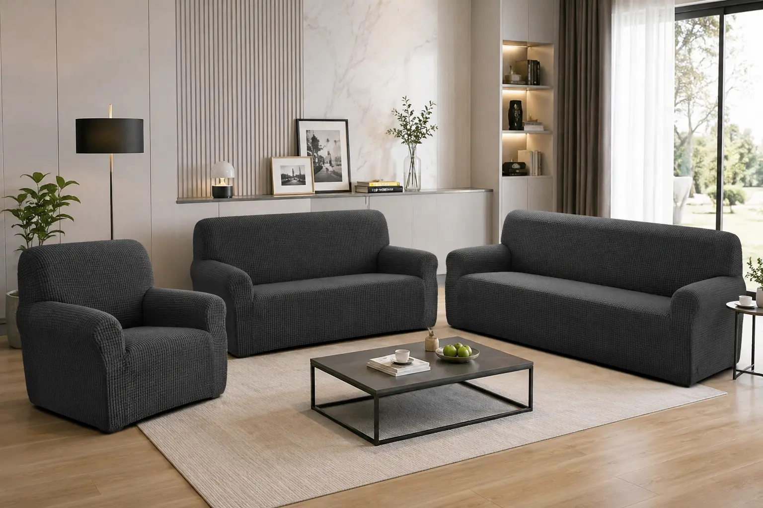 Salon équipé de trois housses anthracite MINIM